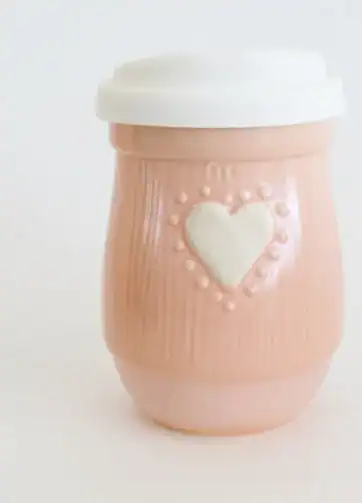 pink travel mug with heart