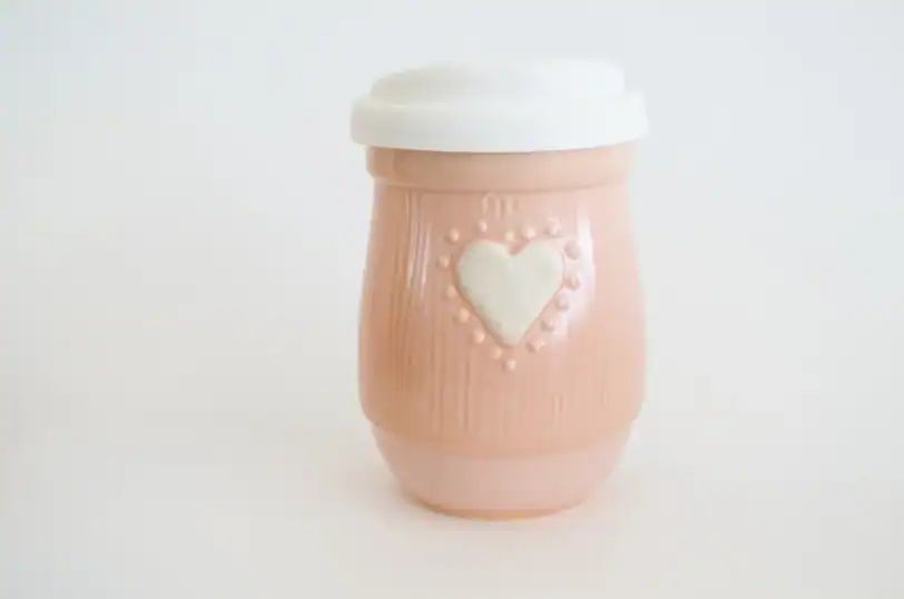 pink travel mug with heart