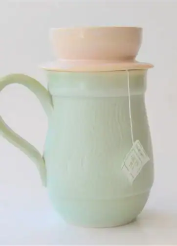 Ceramic Mug with Lid for Tea Bag, Tea Strainer - Light Green