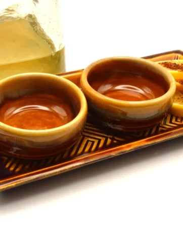 mezcal copitas on tray with lemon